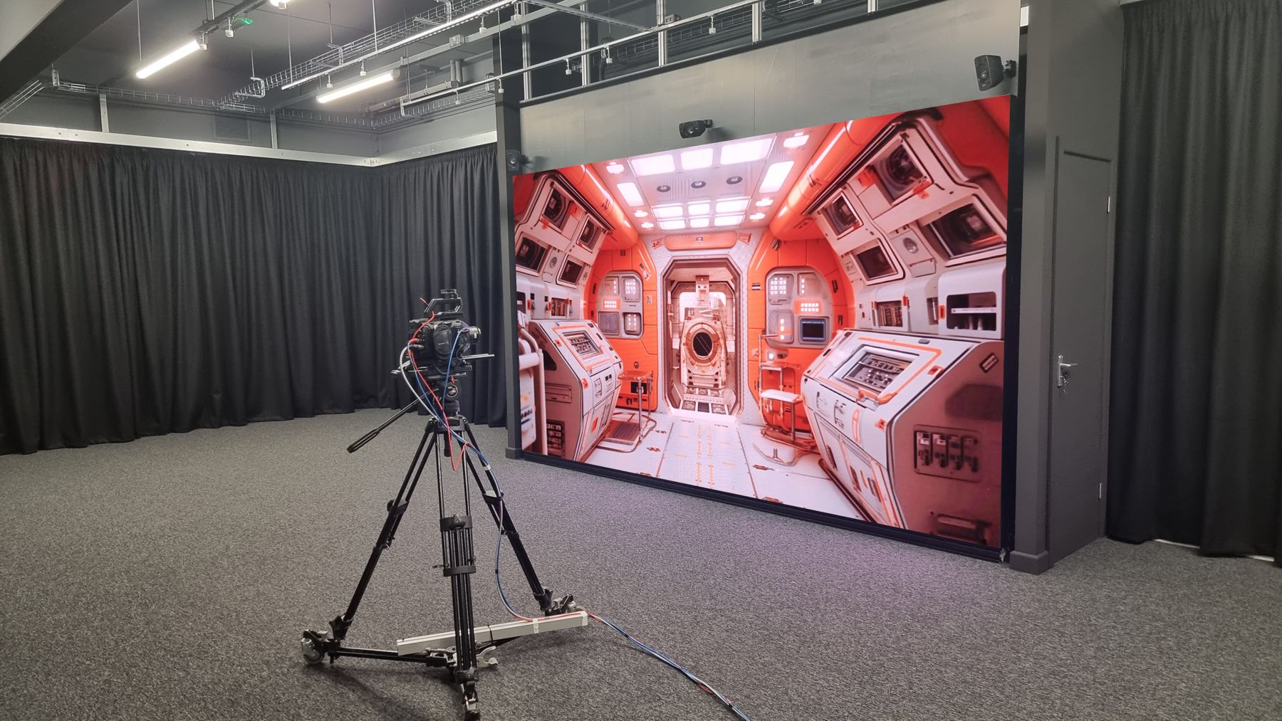 The multi-view LED Powerwall at Newcastle College with a camera on a tripod in front